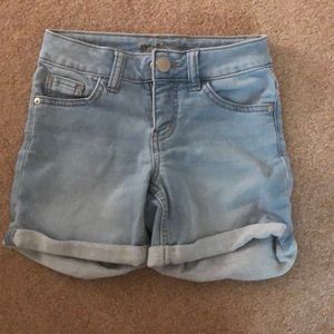 Justice light colored denim shorts